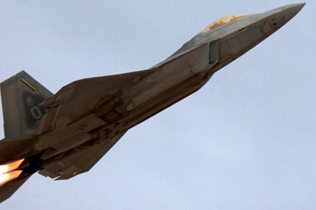The F/A-22 Raptor performs aerial maneuvers during the Aviation Nation airshow on Nellis Air Force Base in November 2007.