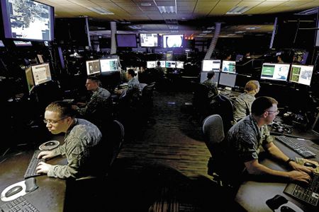 The Data Stops Here: Analysts at distributed ground system number 1 (DGS-1) sift and disseminate the ISR sensor data flowing into Joint Base Langley-Eustis, Virginia, headquarters of the 480th Intelligence, Surveillance and Reconnaissance Wing. The 480th ISR is lead wing for 27 DCGS facilities in the Air Force, which are staffed by some 6,000 air personnel.