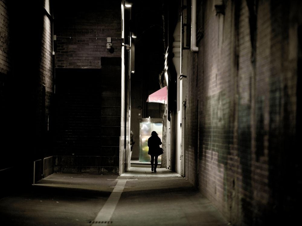 person in alley