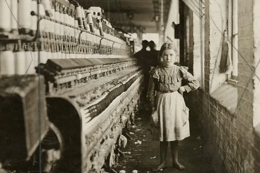 Lewis Wickes Hine's 1909 photograph of "a little spinner in a Georgia cotton mill"