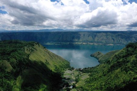 Indonesia&#39;s Lake Toba, formed by a volcanic eruption around 74,000 years ago. In the new study, researchers uncovered fragments of glass from the eruption at an archaeological site in northwest Ethiopia, pointing to the volcano&#39;s global impacts.