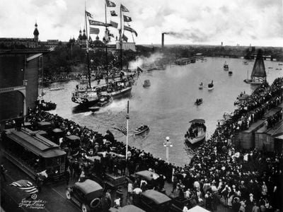 Taken in 1922, the ship Jose Gaspar passes the Lafayette Street Bridge in Tampa during the Gasparilla Festival