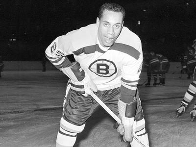 Boston Bruins forward Willie O'Ree warms up prior to a game against the New York Rangers in 1960.