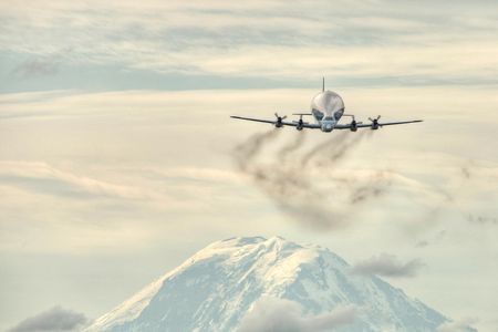 Grand Prize Winner 
Jeff Cook (Over Mt. Rainier, Washington)  |  August 2012. “NASA chose the Museum of Flight to be the recipient of the full-size trainer used by all space shuttle astronauts at the facility in Houston,” says Cook. “Because of its size, the trainer had to be moved by one of the largest transport craft available, the Aero Spacelines B-377-SG/SGT Super Guppy. It took three flights to deliver all the components.” 

