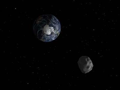 A rendering of Asteroid 2012 DA14, which will pass within 17,200 miles of Earth’s surface.