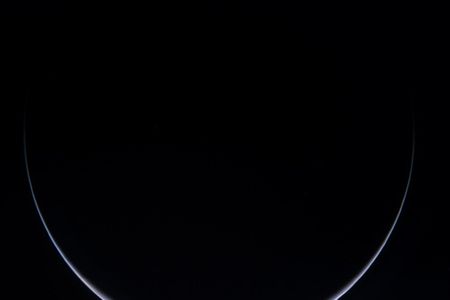 A comet-bound spacecraft swings past its home planet.