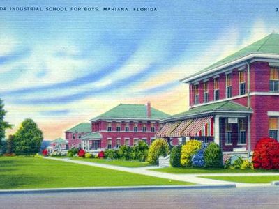 A vintage postcard presents a deceptively sunny view of the school