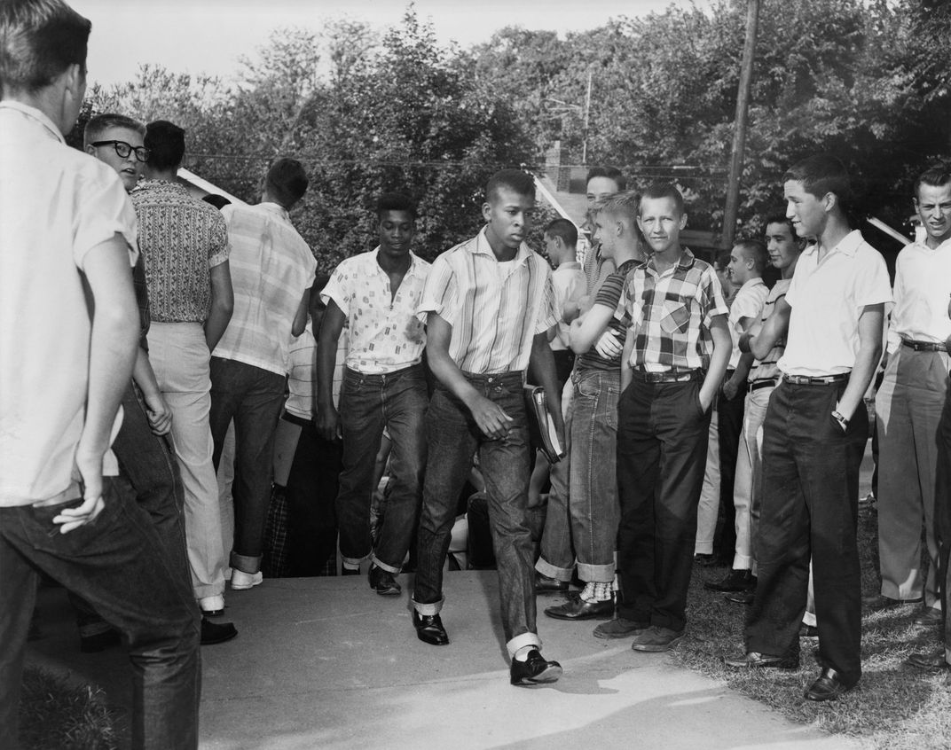 Black students arrive at Clinton High School, the first Tennessee public school to integrate