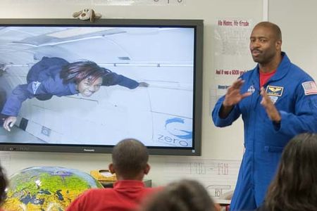 STS-129 Mission Specialist Leland Melvin speaks to students at the Howard University Middle School of Math and Science, Tuesday, Jan. 12, 2010, on the campus of Howard University in Washington. Photo Credit: (NASA/Paul E. Alers)