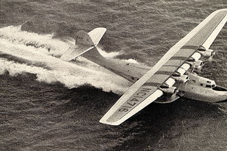The China Clipper "scudded along a considerable sea swell" before vaulting into the air, reported Leo Kieran.