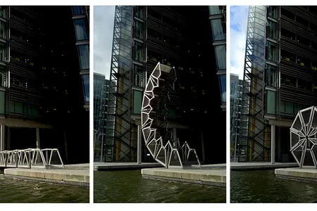 The rolling hydraulic bridge at London’s Paddington Basin built in 2004 curls up on itself like a pillbug.