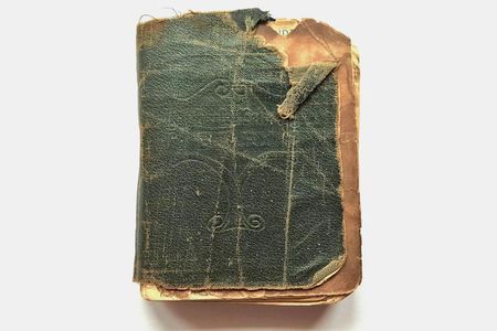 Claude Nuttall's pocket diary measures just under four inches long.