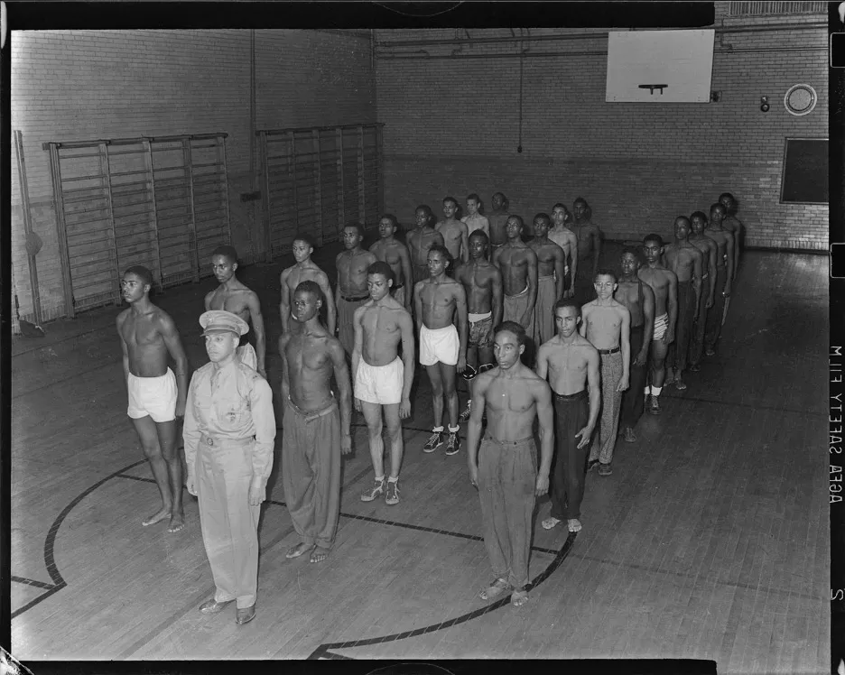 Men standing in lines at YMCA