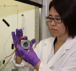 Engineer Hong Liu works with the fuel cell in the lab.