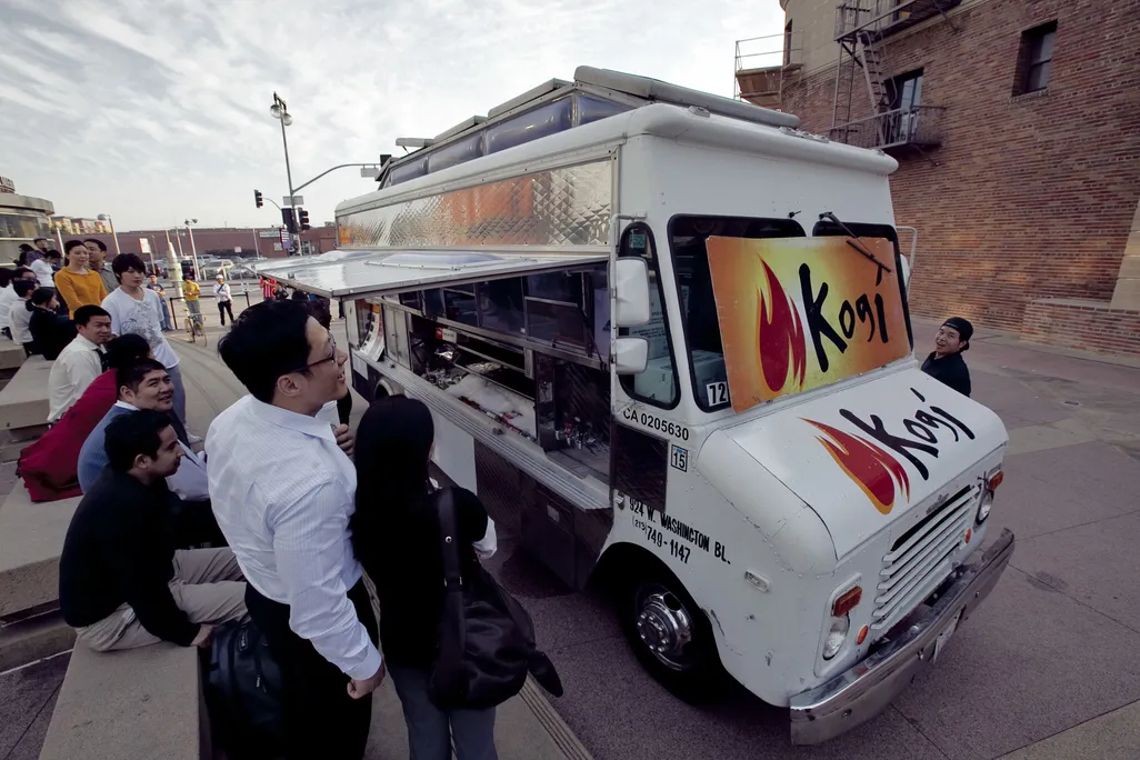 People wait in line at the Kogi Korean BBQ truck in Los Angeles.
