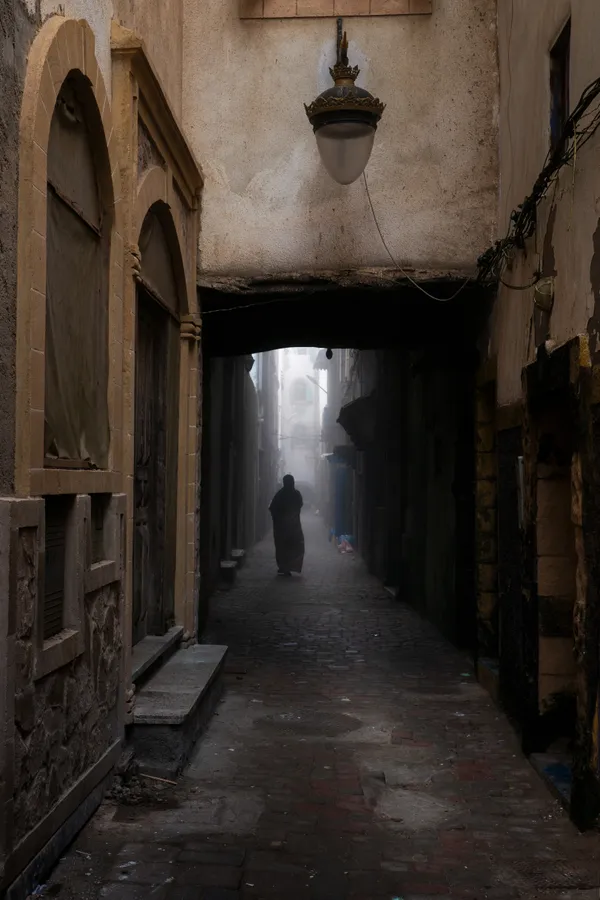 A Silhouette Through a Moroccan Alley thumbnail
