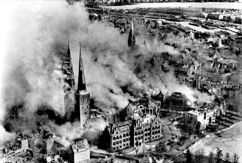 Burning buildings after the 1942 bombing raid