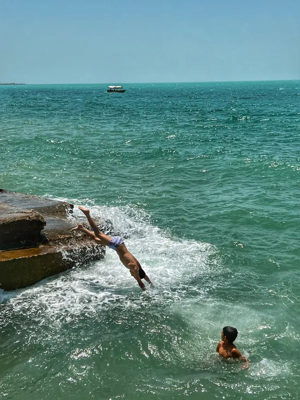 Summer Fun: Children Playing in the Southern Sea of Iran thumbnail