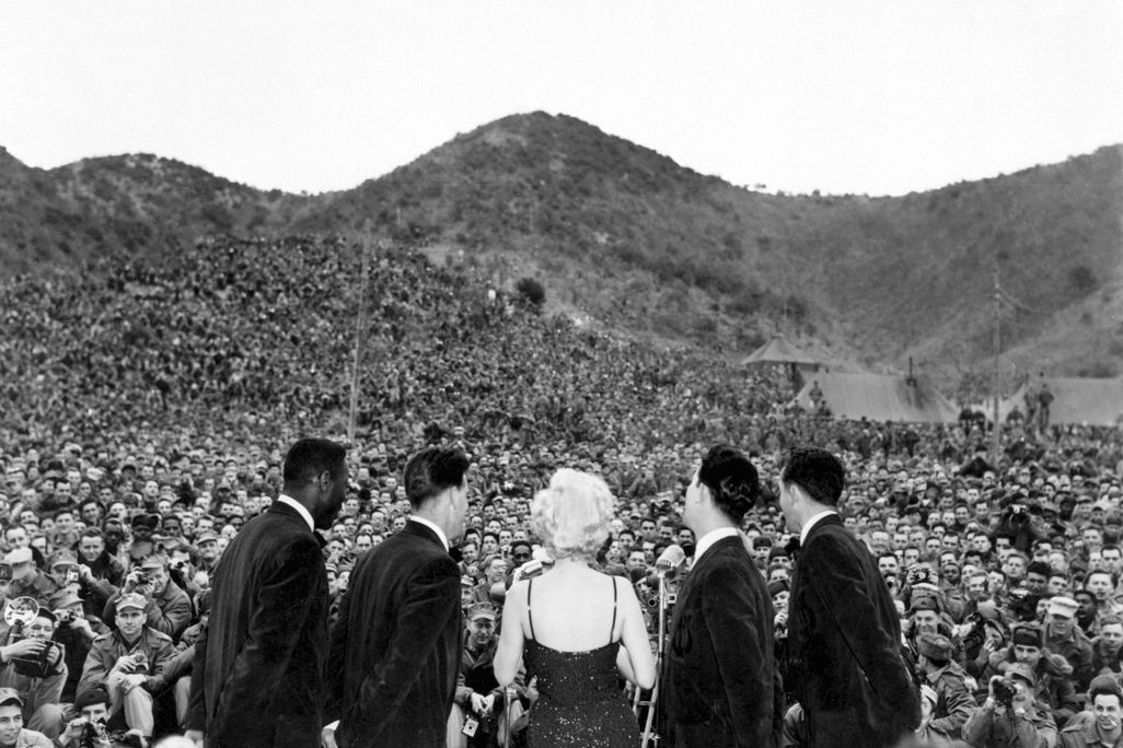 Marilyn Monroe performs in front of soldiers in Korea in 1954.