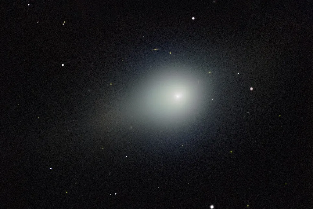 Comet 3I/ATLAS zooming through space surrounded by stars