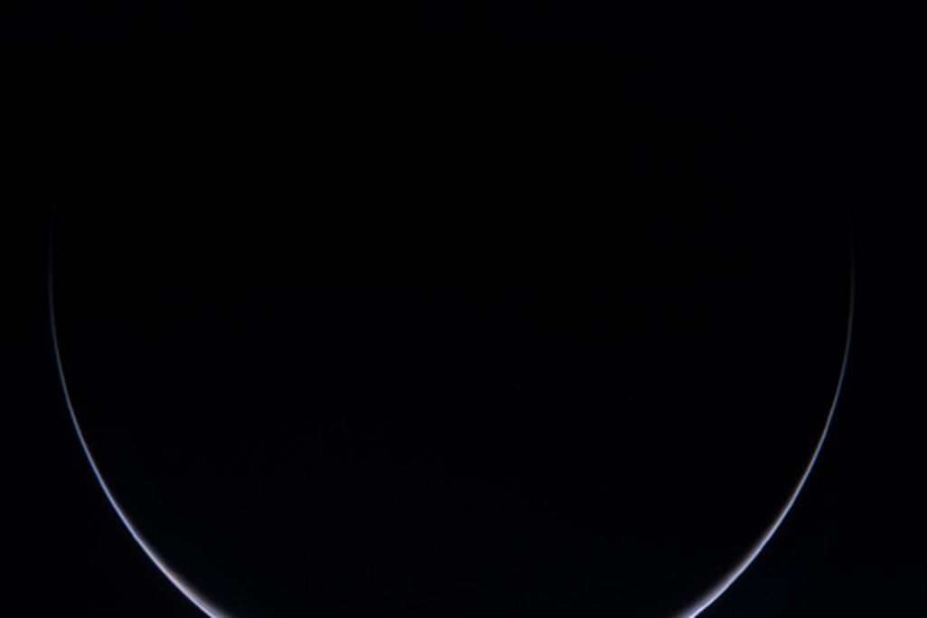 A comet-bound spacecraft swings past its home planet.