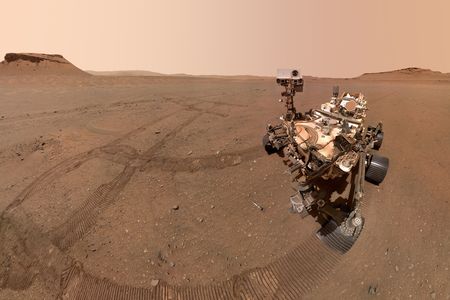 NASA's Perseverance Mars rover took this selfie with some of the sample tubes it left on the Red Planet's surface using the camera at the end of its robotic arm.