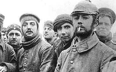 Riflemen Andrew and Grigg (center)—British troops from London—during the Christmas Truce with Saxons of the 104th and 106th Regiments of the Imperial German Army.