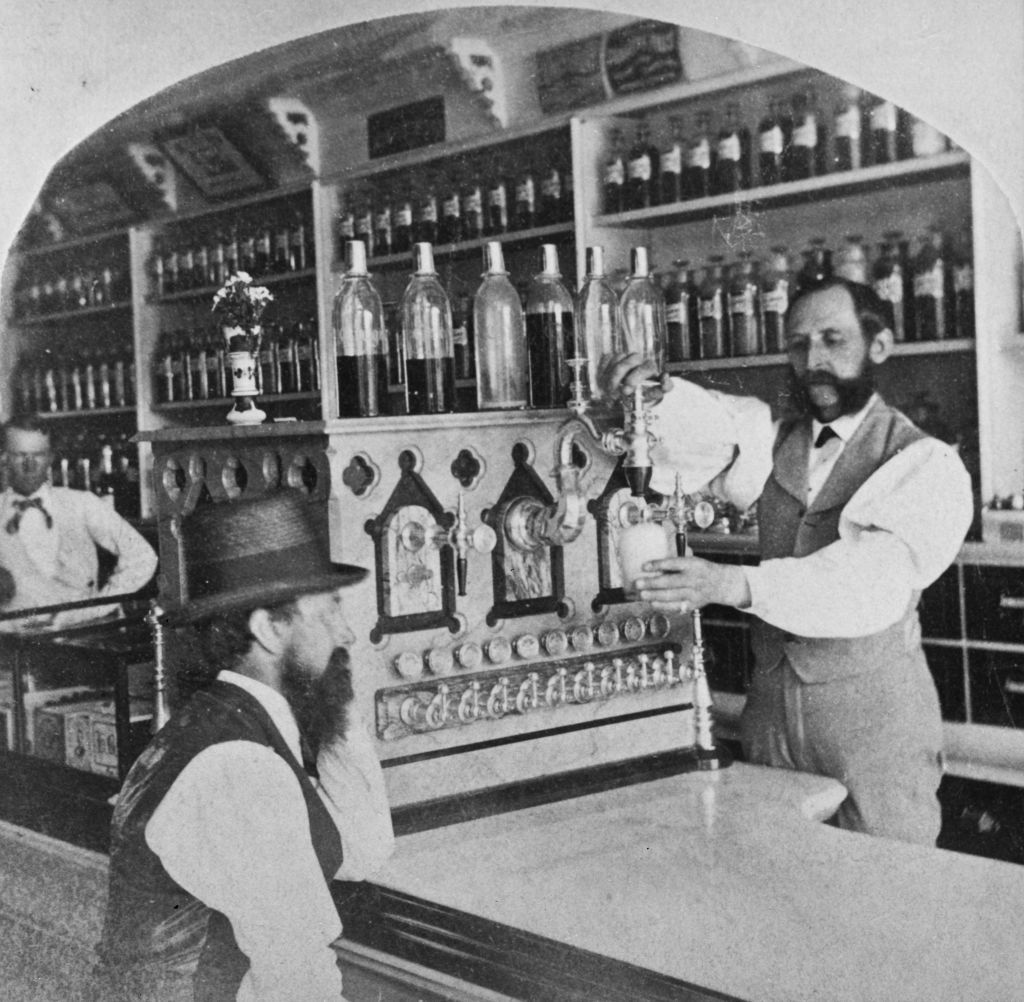 Pharmacist uses a soda fountain