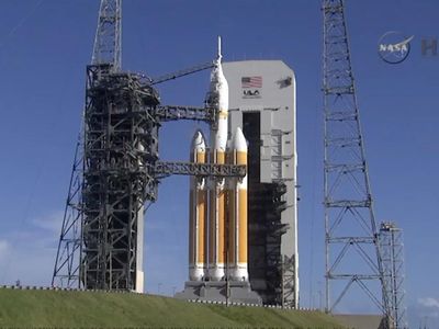 The Orion capsule idles on the pad atop a Delta IV Heavy rocket just minutes after the launch was canceled. 