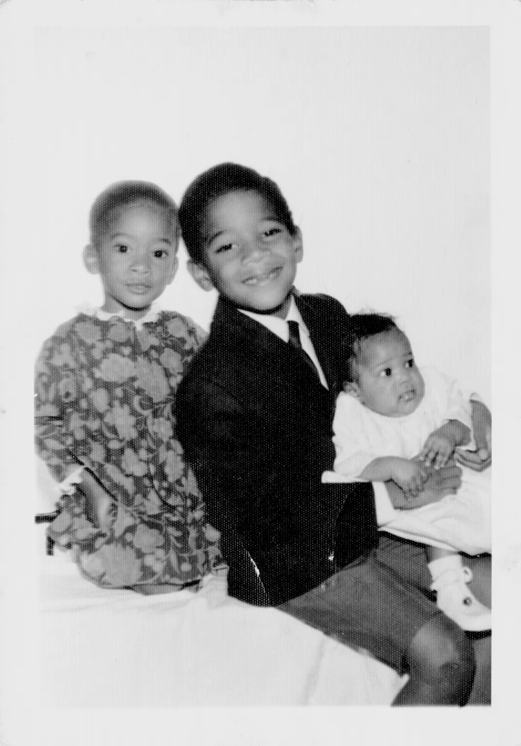 Jean-Michel Basquiat with his sisters Lisane and Jeanine