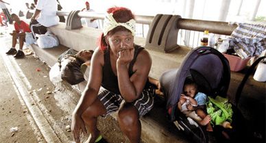 "Where's the help?" Cynthia Scott demanded of photographer Michael Ainsworth after three days stranded on an overpass.