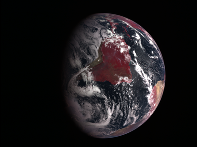 An abundance of life: Plant-covered land is red in this combined visible light/infrared view of Earth from the Messenger spacecraft.
