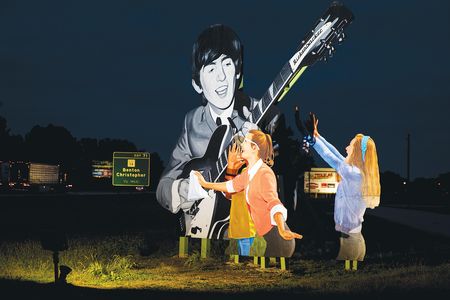 A billboard near Benton, Illinois. The rock 'n' roller from Liverpool was unknown in the States when he visited the town in 1963.