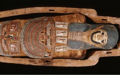 Within this sarcophagus and underlying wrappings is the mummified body of a man who died 2,000 years ago (150 B.C.-50 A.D.)