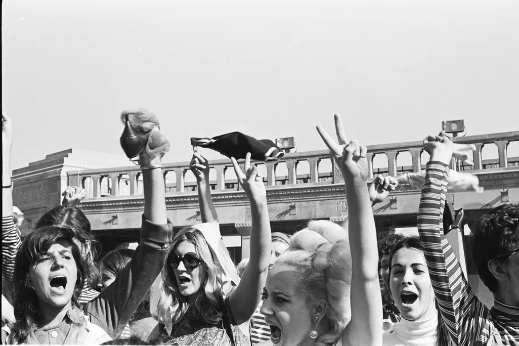 Women gleefully threw objects