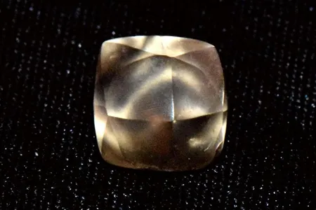 Aspen Brown unearthed the golden-brown diamond while visiting Crater of Diamonds State Park with her family.
