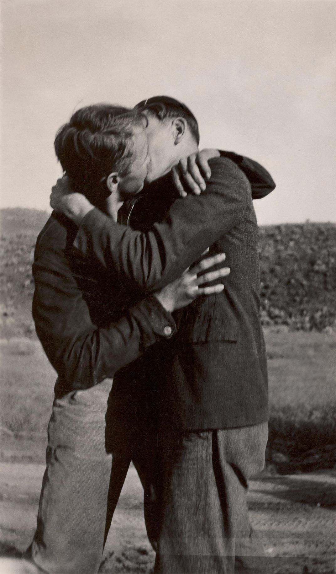 Gay men kissing