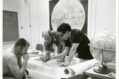 Thanks to geologist Farouk El-Baz (right), the astronauts in lunar orbit knew just what they were looking at, and we can all touch a moon rock 50 years later.