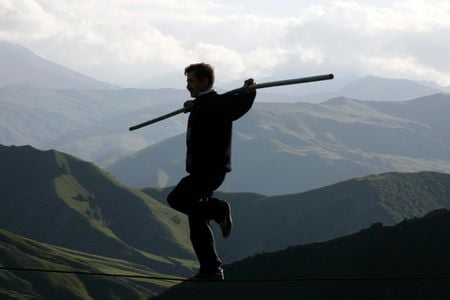 A man walks on a tight rope in the remote mountain village of Tsovkra-1.
