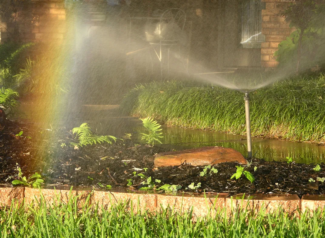 Sprinklers turn ordinary lawn into rainbow landscape | Smithsonian ...