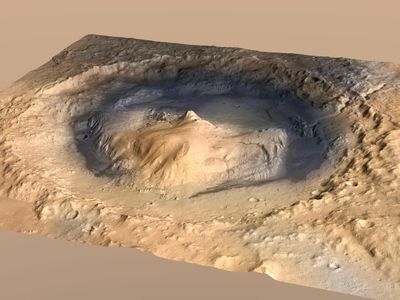 The central peak within Gale Crater rises 18,000 feet above the valley floor.