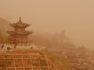 View of ancient buildings in a sandstorm in Lanzhou city, northwest Chinas Gansu province, 24 April 2014