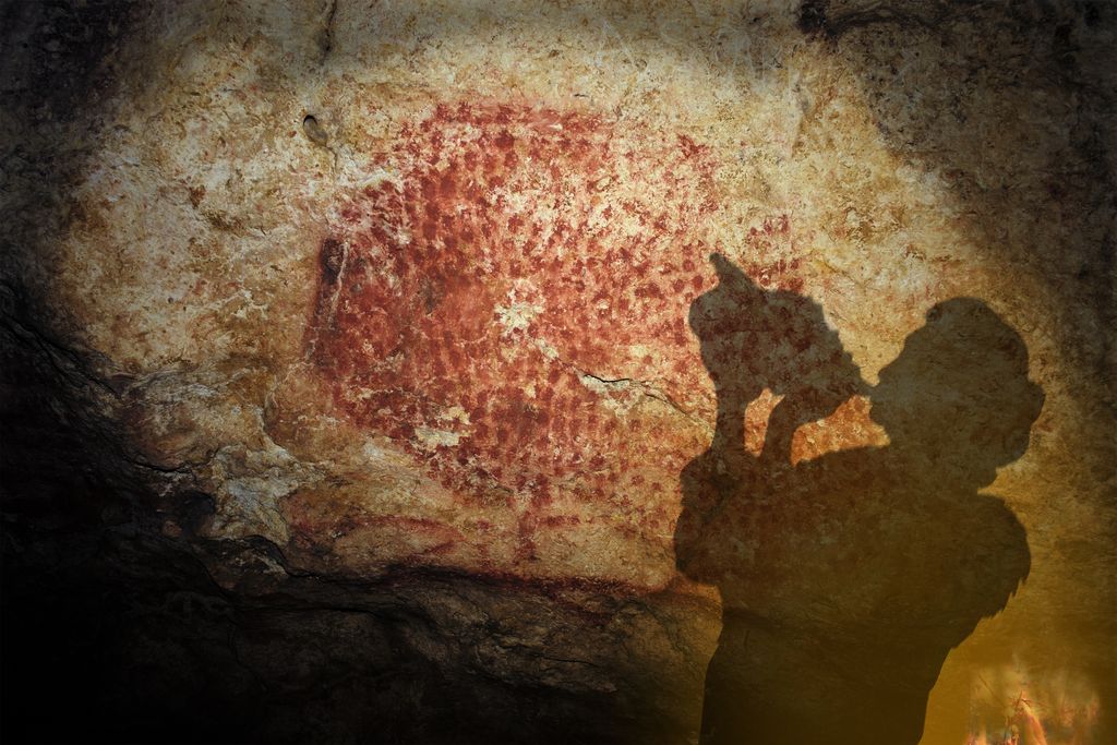 Artist's rendering of a prehistoric human playing the ancient conch instrument