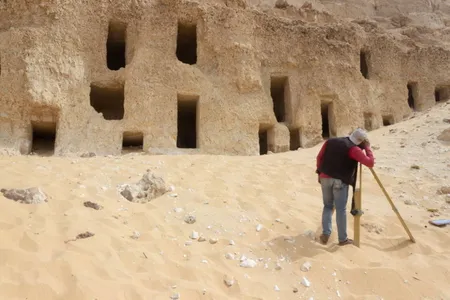 The rock-cut tombs are carved into different levels of a mountain face at the site.