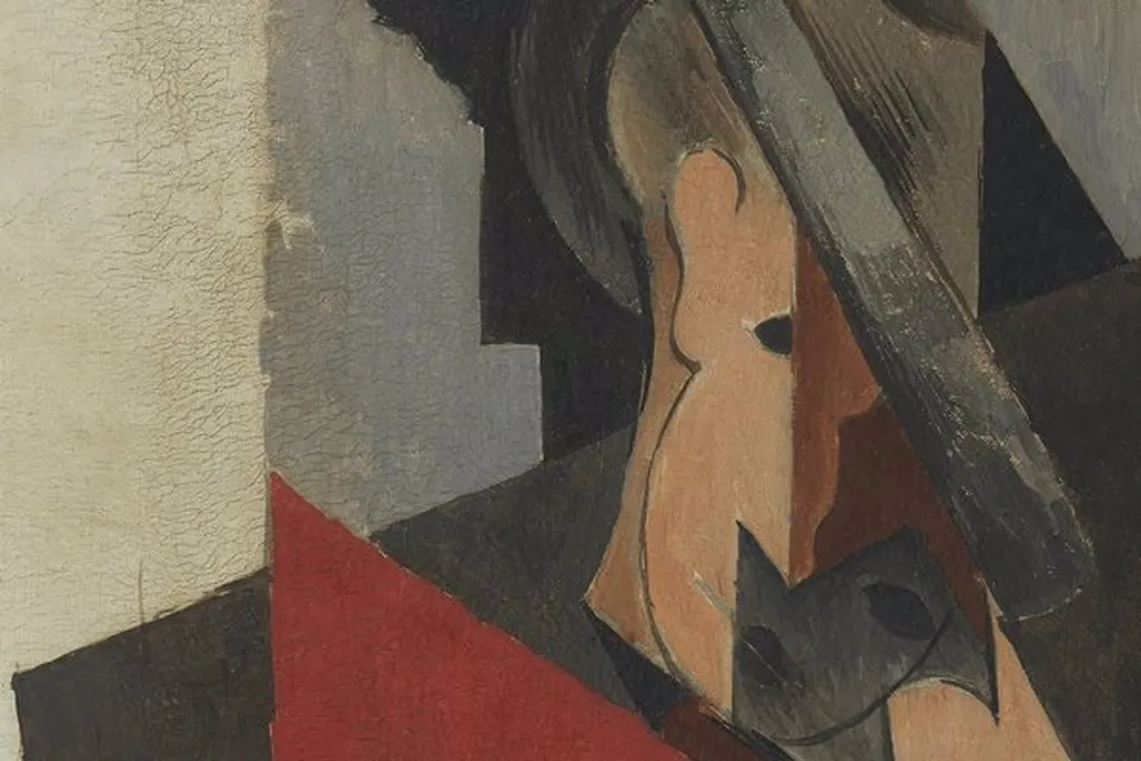 A close up of a man's Cubist portrait, who appears to be wearing a hat and is composed of angular shapes; various cracks are visible 