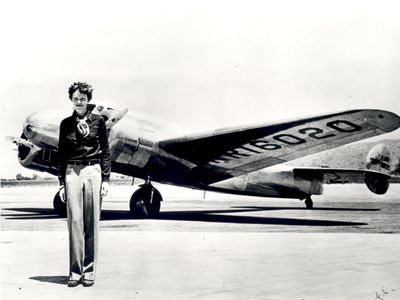 Amelia Earhart and the Lockheed Electra she was flying when she disappeared in 1937.