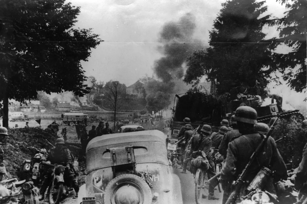 Motorized infantry of the German armed forces advance into Ukraine during World War II.