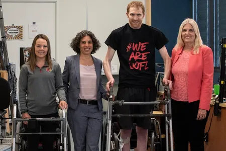 Study participants Kelly Thomas, who was paralyzed in a truck crash and Jeff Marquis, who was injured while mountain biking. 