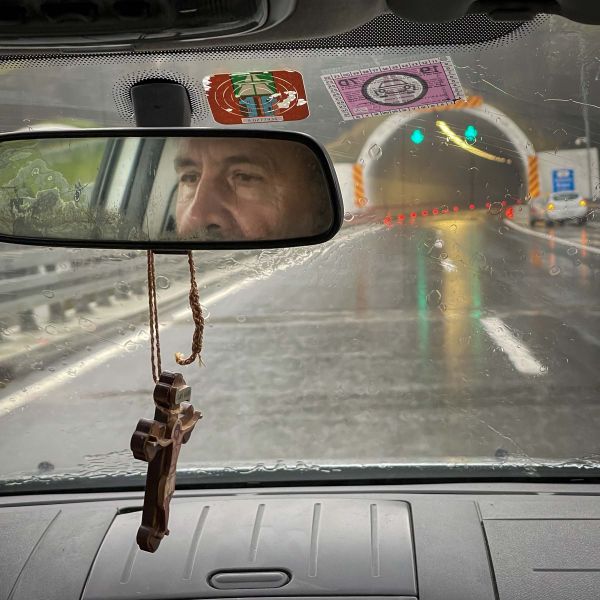 Fr. Blasko drives up down the Miloš the Great autoput on a rainy day. thumbnail