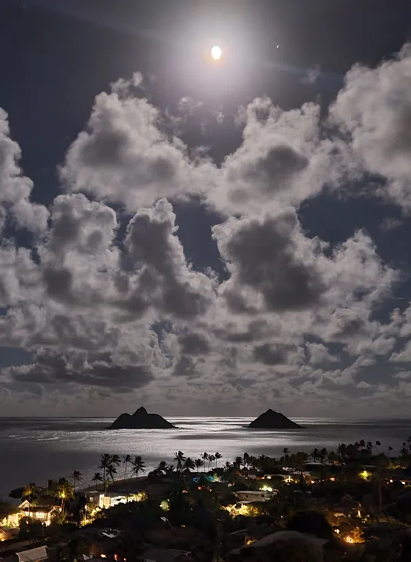 Spectacular Harvest Supermoon bathes the Mokulua Islands in Lanikai, Oahu, Hawaii thumbnail